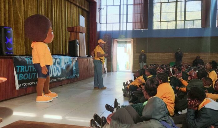KeMo mascot addresses Grade 7 and 8 learners during a drug awareness session at Leondale Hoërskool.