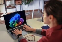 Can a laptop solve South Africa’s AI challenges? Lenovo thinks so Professional using the Lenovo ThinkPad X9 Aura Edition laptop at a desk in a bright modern workspace.