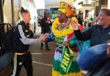 Mama Joy leads Banyana’s colourful Goals 4 Pads send-off as Morocco mission begins Mama Joy greets Gabriela Moodaly-Salgado during Banyana Banyana's WAFCON departure at OR Tambo Airport.