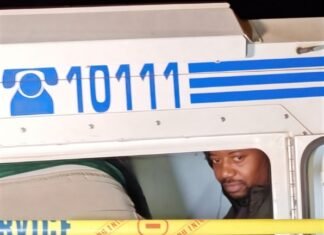WATCH: UK fugitive Mark Tshuma arrested by SAPS in Johannesburg Ndodana "Mark" Tshuma sits inside a SAPS police vehicle after his arrest in Kensington, Johannesburg.