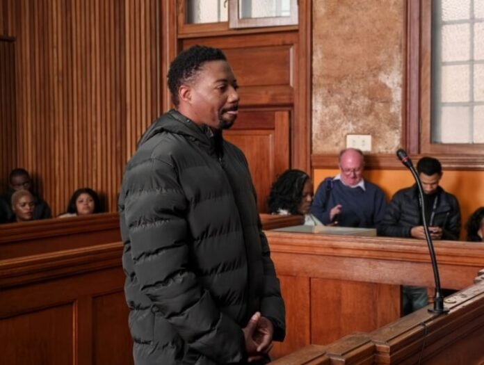 Ndodana Mark Tshuma stands in Johannesburg Magistrates' Court during his first court appearance