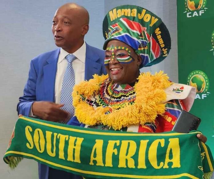 CAF President Patrice Motsepe with Mama Joy after announcing record WAFCON prize money ahead of Morocco 2026.