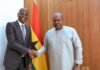 South Africa defeats Ghana’s AU bid to “single out and isolate” the country Ronald Lamola shakes hands with Ghana President John Mahama during a meeting in Accra, with Ghana's national flag behind them.