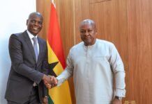 South Africa defeats Ghana’s AU bid to “single out and isolate” the country Ronald Lamola shakes hands with Ghana President John Mahama during a meeting in Accra, with Ghana's national flag behind them.
