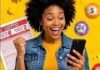 Saturday’s Daily Lotto results: Check the July 11 winning numbers Woman smiles at smartphone with Lotto ticket, colourful lottery balls and yellow background with floating numbered balls.