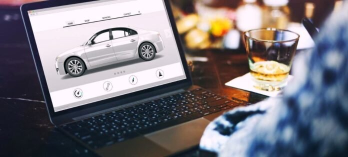 Online car shopping on a laptop, highlighting rising vehicle sales scams in South Africa.