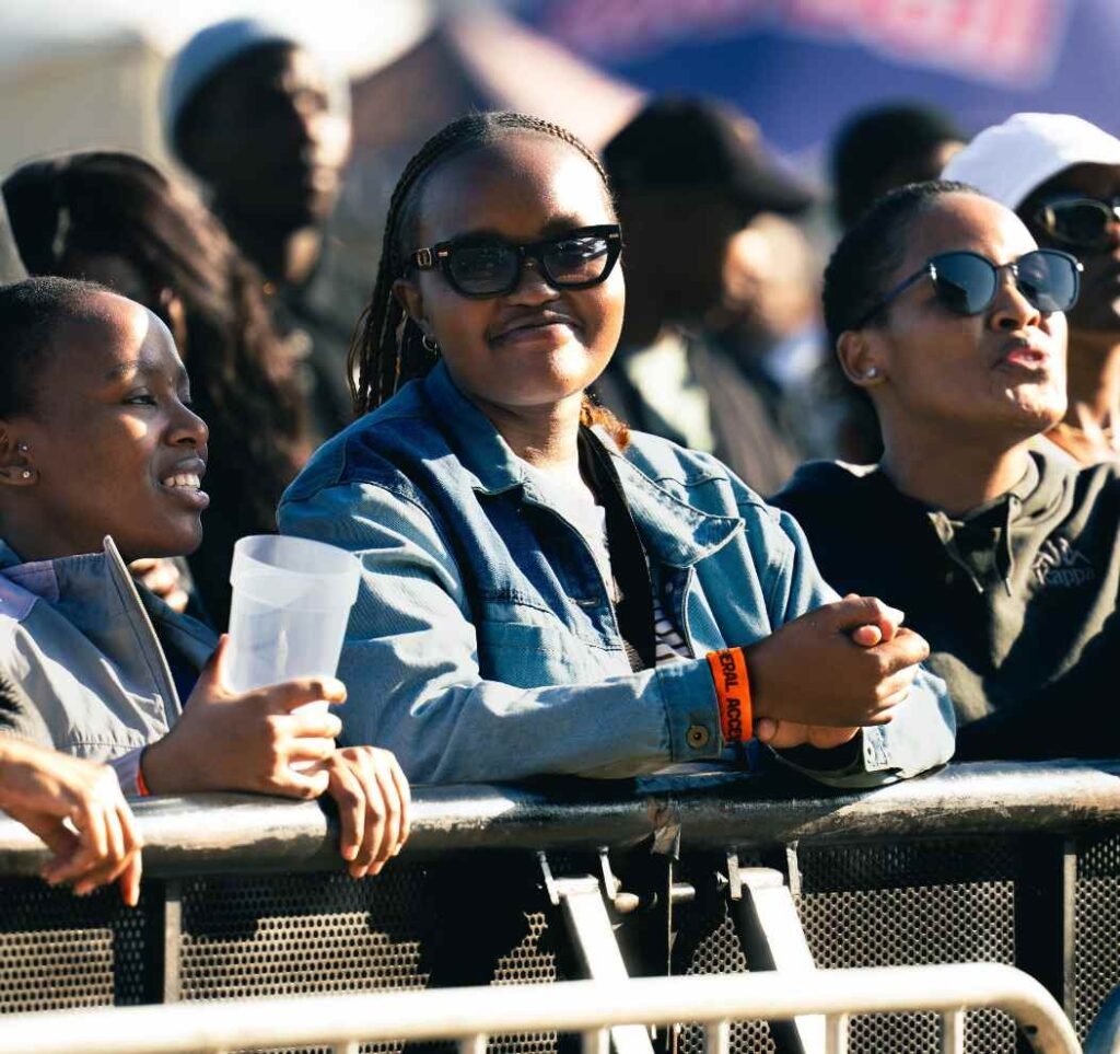 Fans lean against the barrier at Scatterlings Music Festival, Huddle Park, Johannesburg