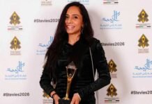 2027 Stevie Awards: Entries open for businesses across 17 Middle East & North Africa nations Aeysha Coetzee-Ismail smiling and holding a gold Stevie Awards trophy in front of a #Stevies2026 backdrop