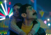 Saudi Film Nights makes South African debut with Joburg Film Festival Mohamad Aldokhei carries a child at a fairground in Saudi film Night Courier