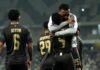 Pirates thrash Kruger United as Durban City and Stellenbosch share the points Orlando Pirates players in black kit embrace in celebration on the pitch.