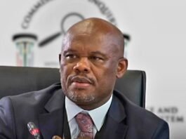 Sibiya faces rape, trafficking and grooming charges: a timeline of the allegations Lt-Gen Shadrack Sibiya in a dark suit seated before a blurred Commission of Inquiry backdrop