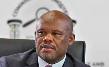 Sibiya faces rape, trafficking and grooming charges: a timeline of the allegations Lt-Gen Shadrack Sibiya in a dark suit seated before a blurred Commission of Inquiry backdrop