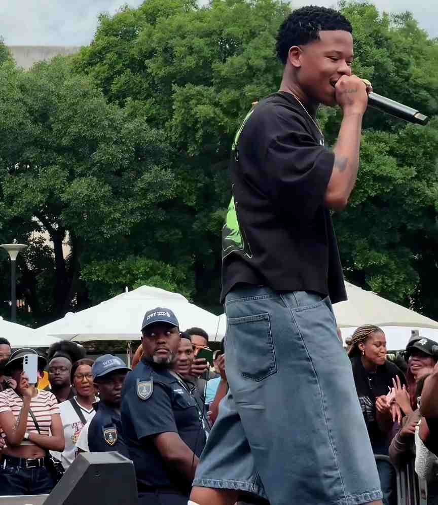 Nasty C performs at Mahindra Fusion Fest at Wits as fans record the rapper on their phones.